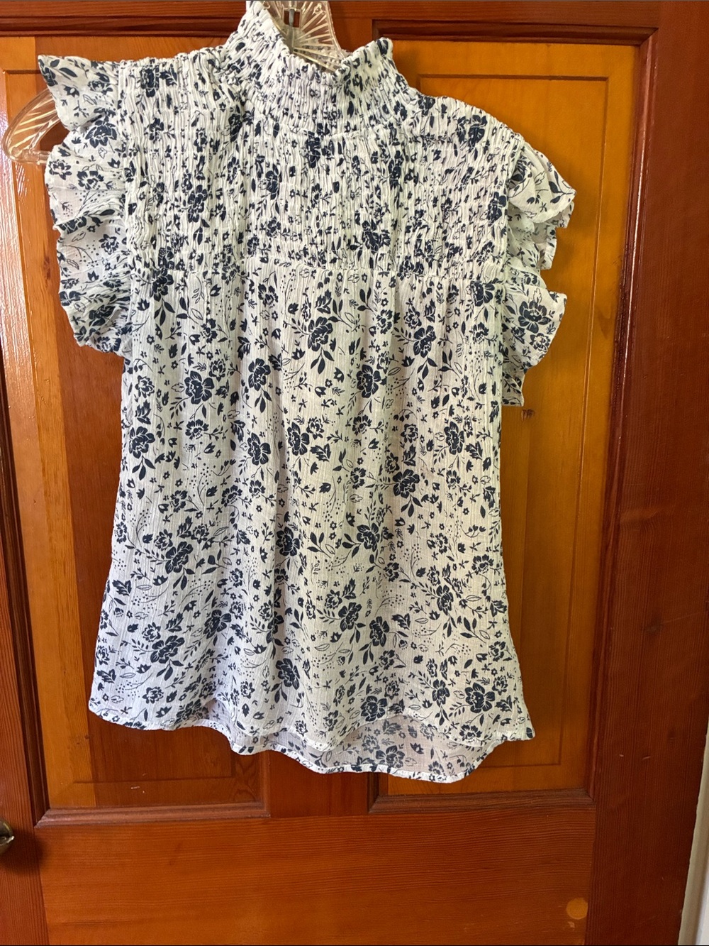 Adiva White Top with Navy Floral Smocked Neck and Ruffle Sleeves